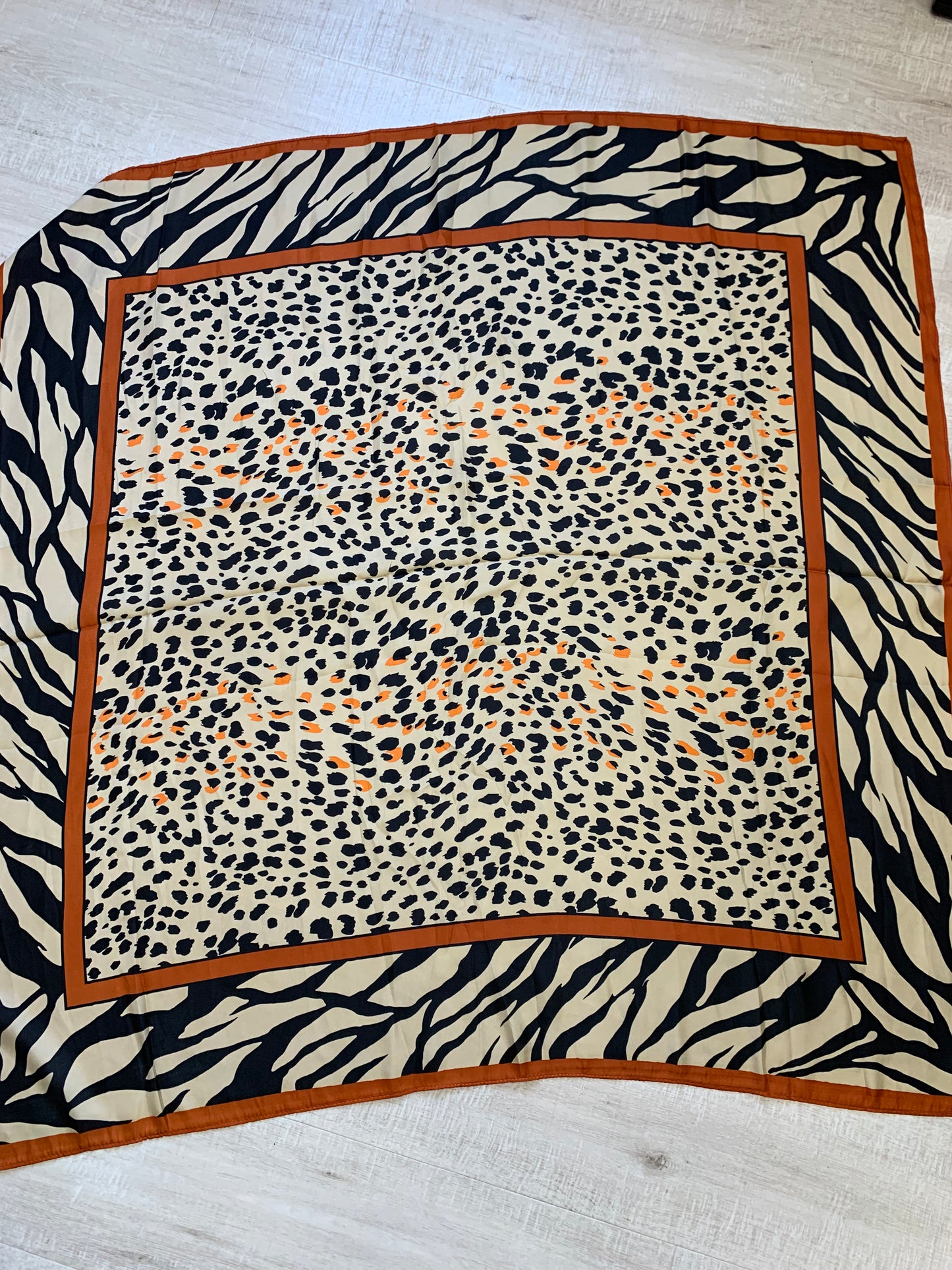 Rust and beige animal print silky square scarf