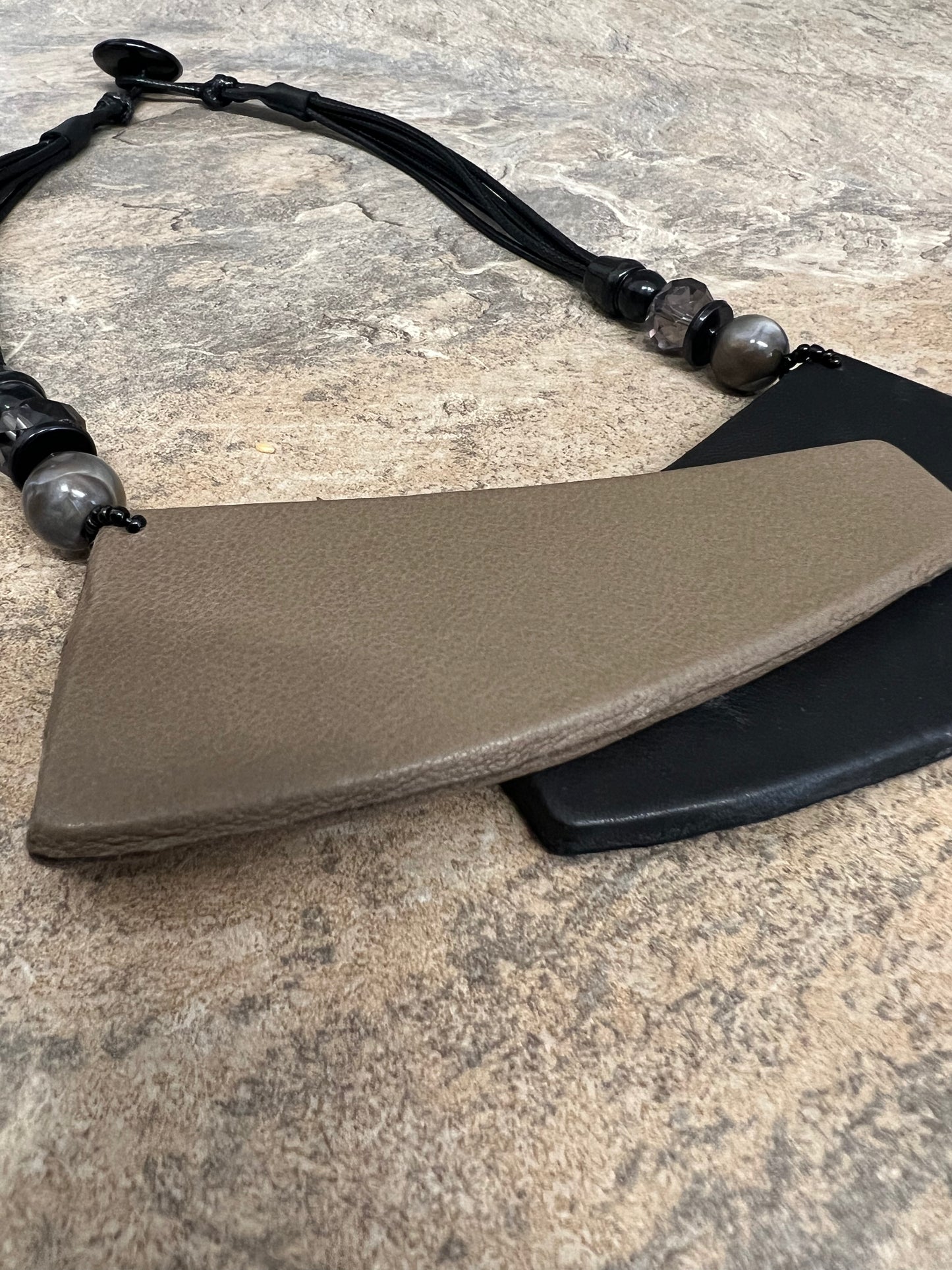 Sarah Tempest geometric faux leather shaped necklace