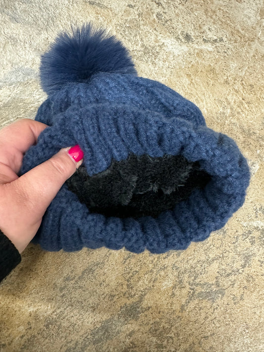 Navy blue cable fleece lined pompom hat