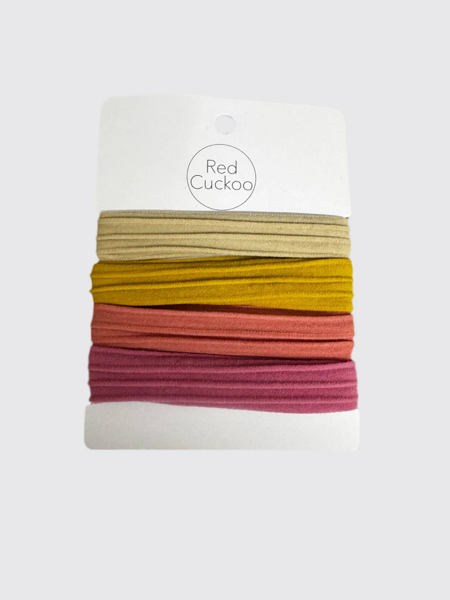 Red Cuckoo pink elastic hair ties four pack