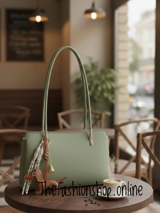 Skyla sage green shoulder bag with dachshund charm