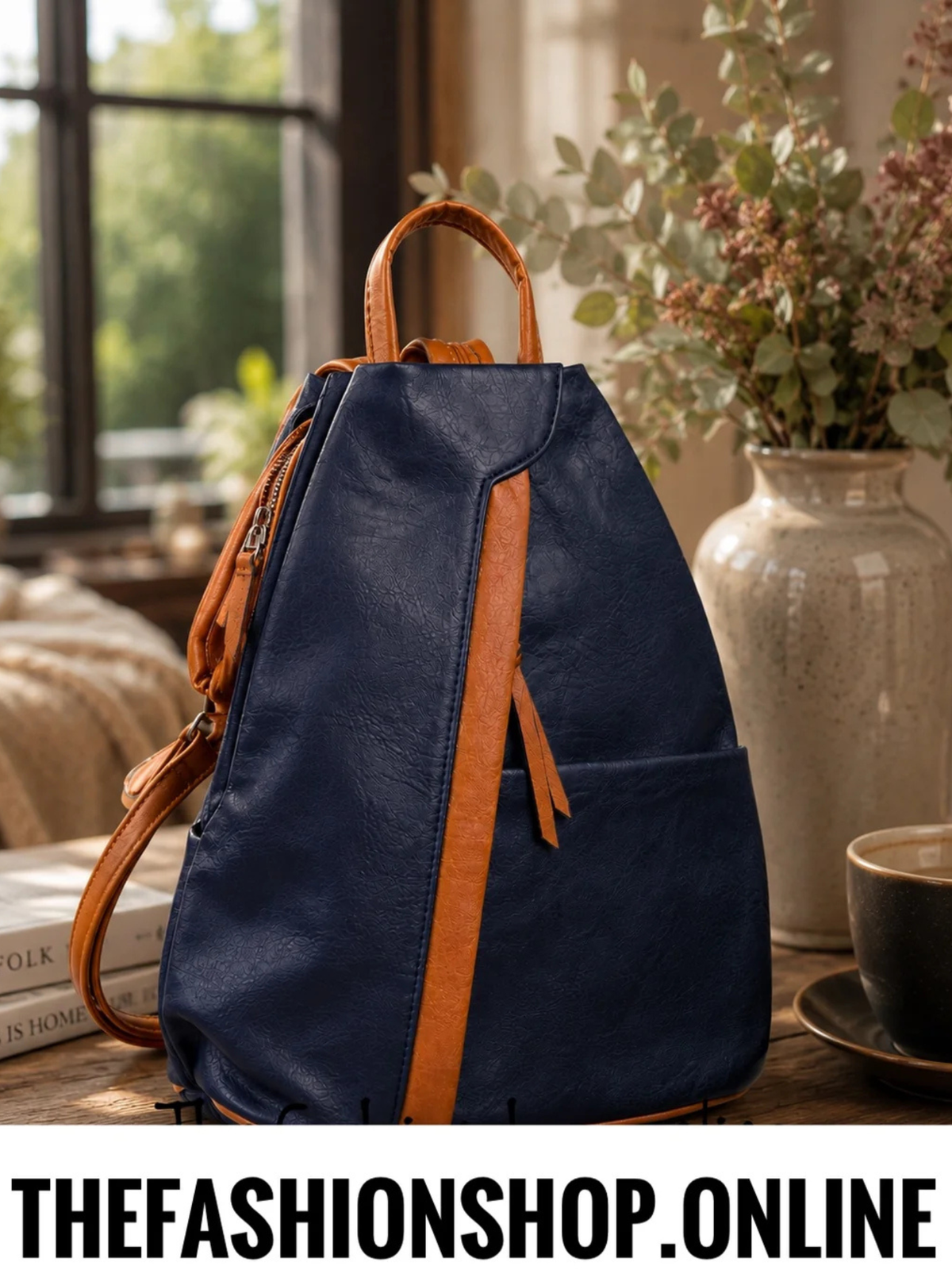 The Charlie Anti Theft Ruck Sack in Navy and Tan