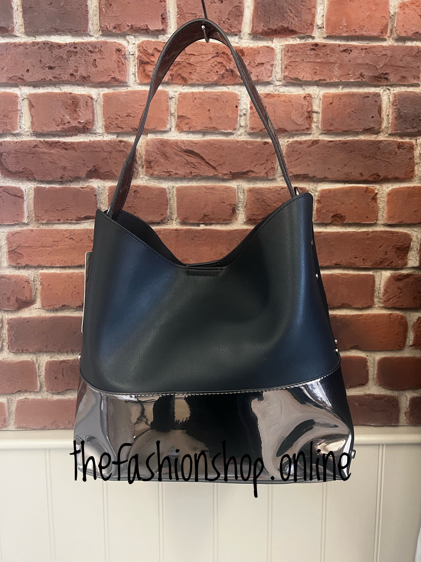 Black and metallic bag in bag