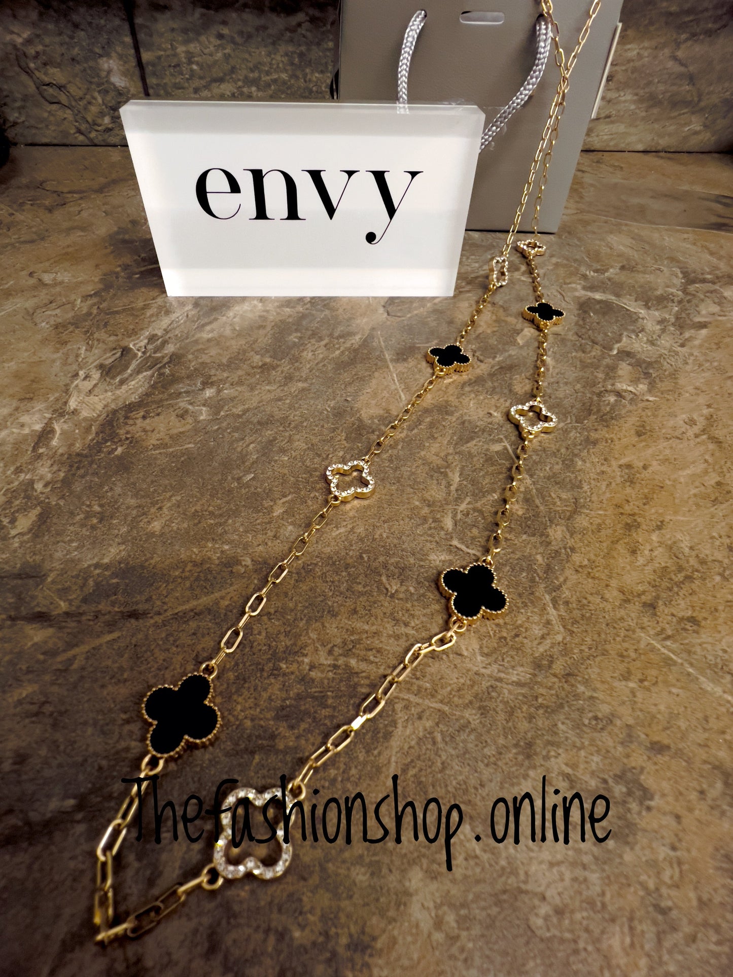 Envy black and gold sparkle clover necklace