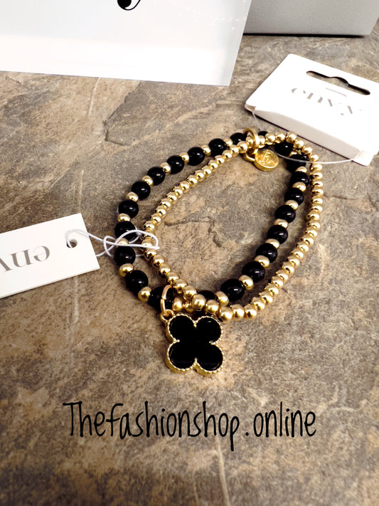 Envy layered clover bracelet in black and gold