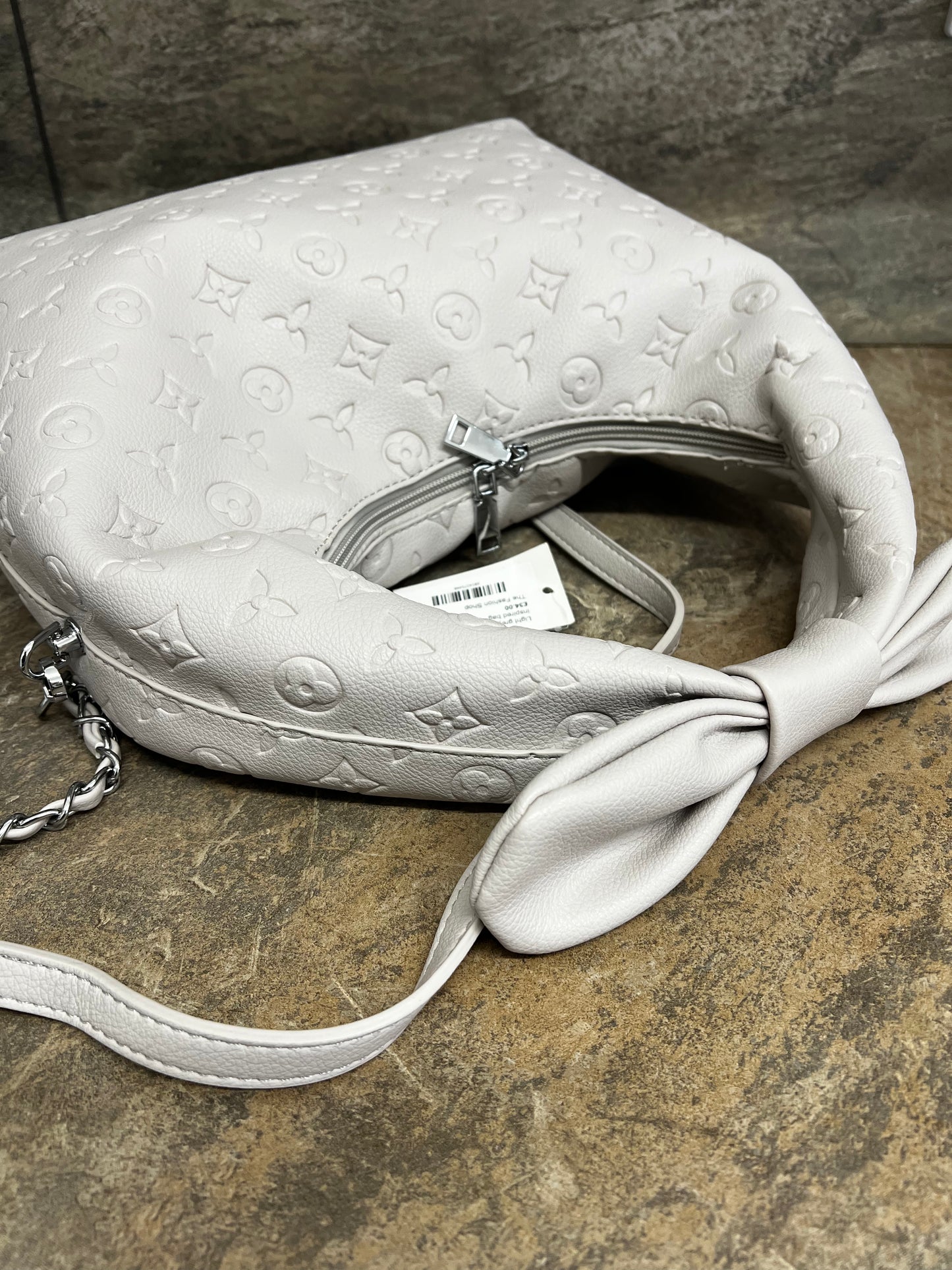 Light grey bow detail designer inspired bag