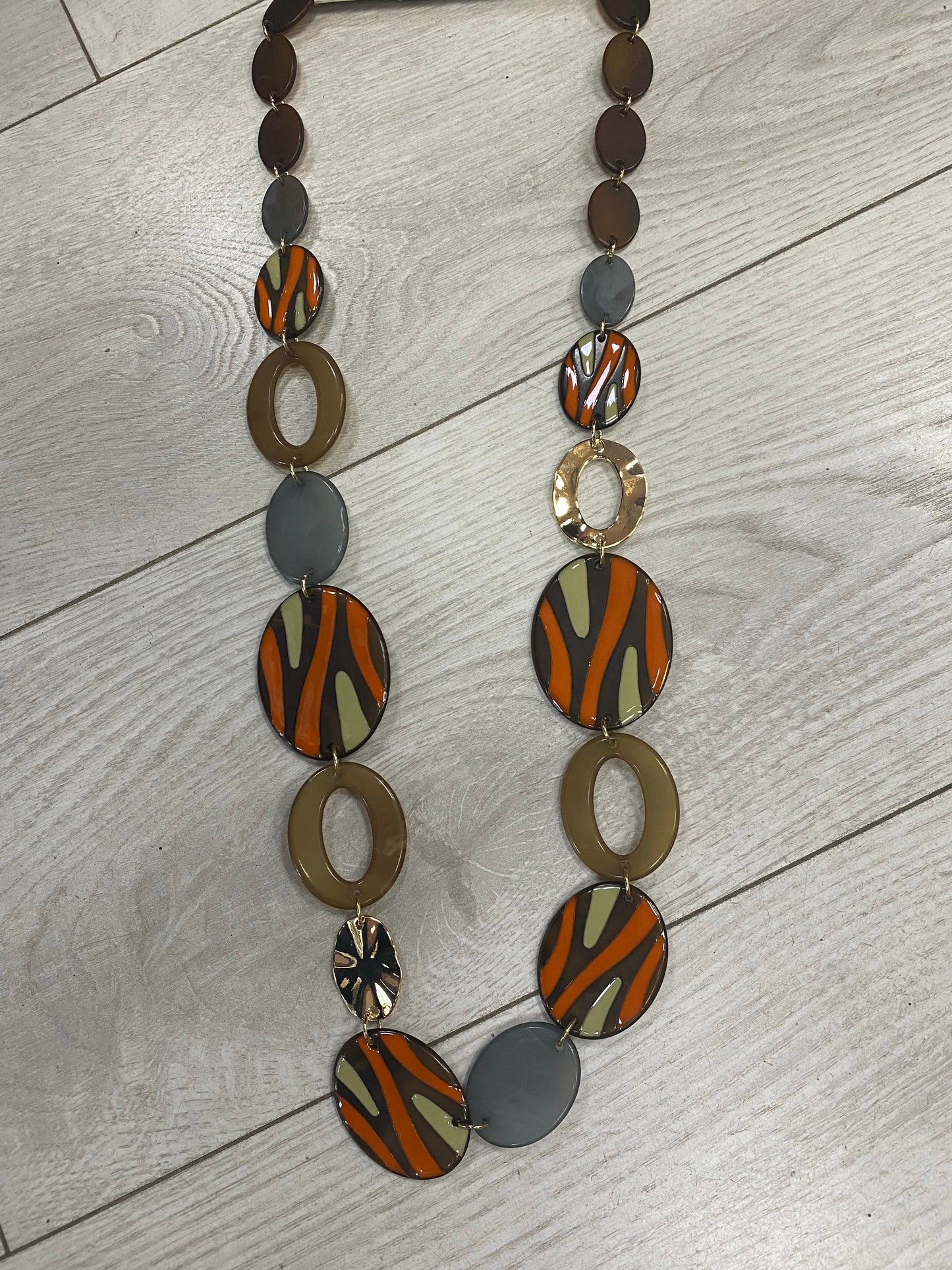 Orange ripple flat pebble necklace