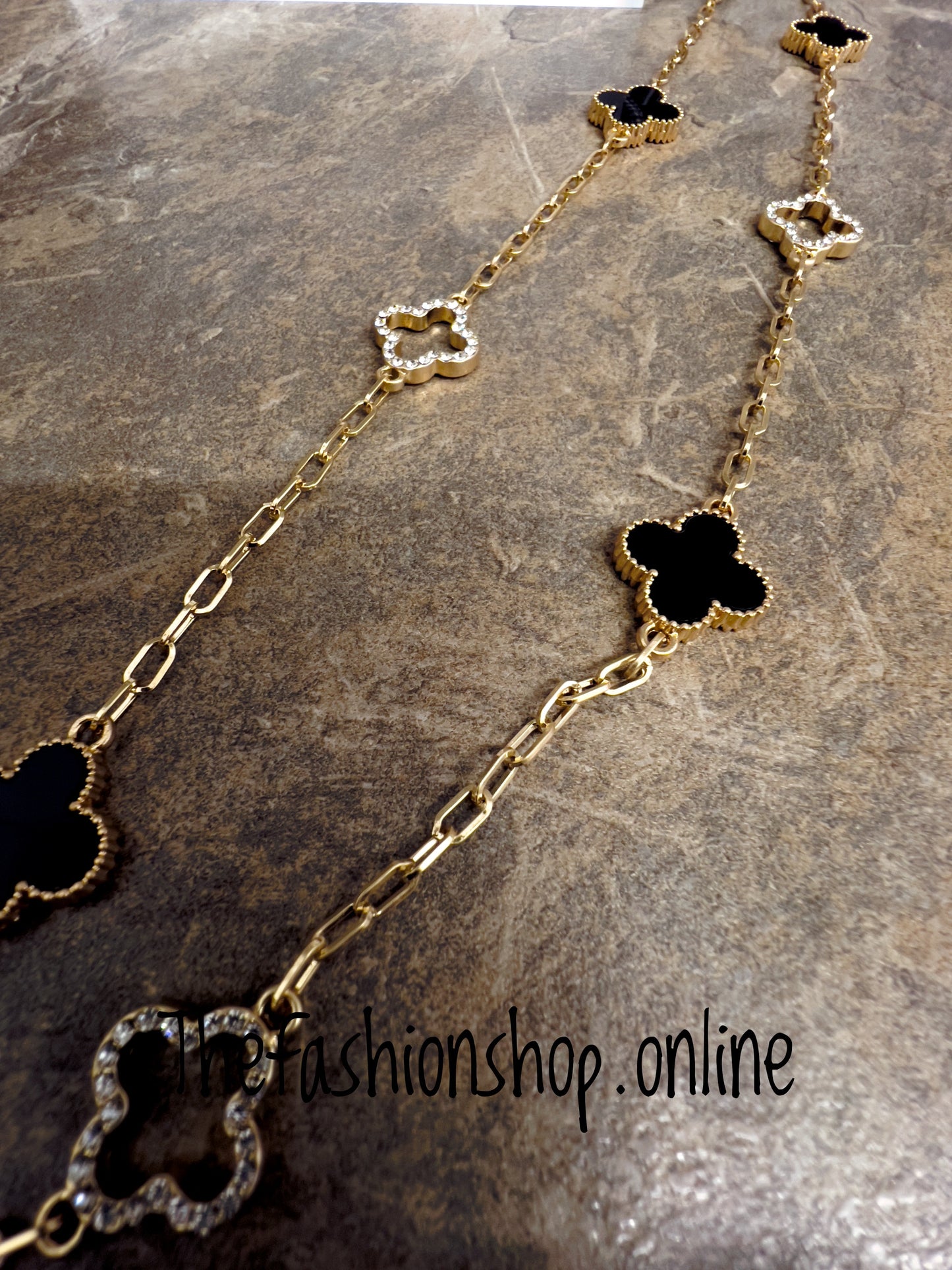 Envy black and gold sparkle clover necklace