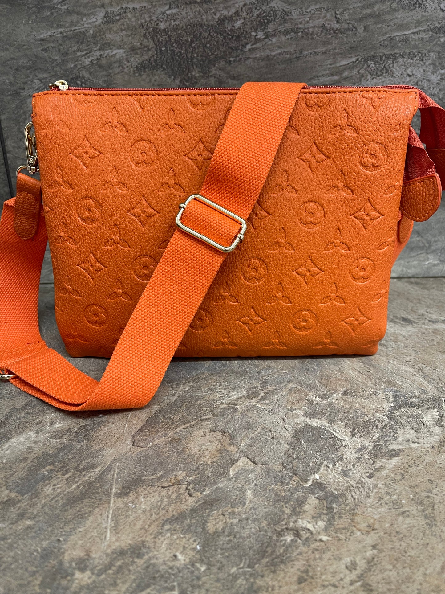 Orange designer inspired triple compartment bag