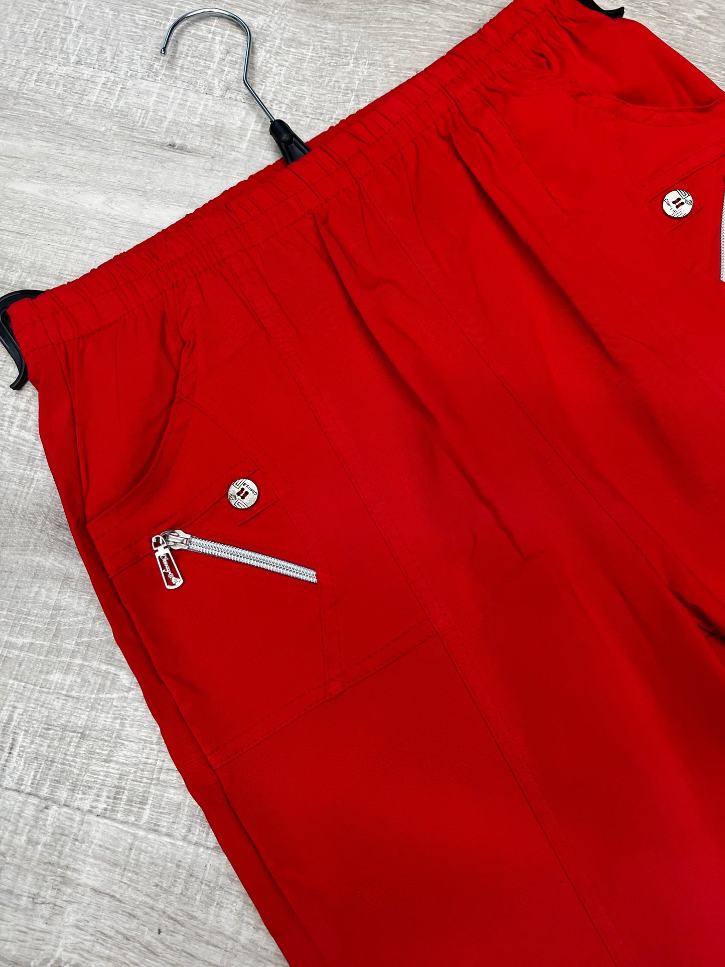 Red stretchy button detail cropped trousers sizes 10-26