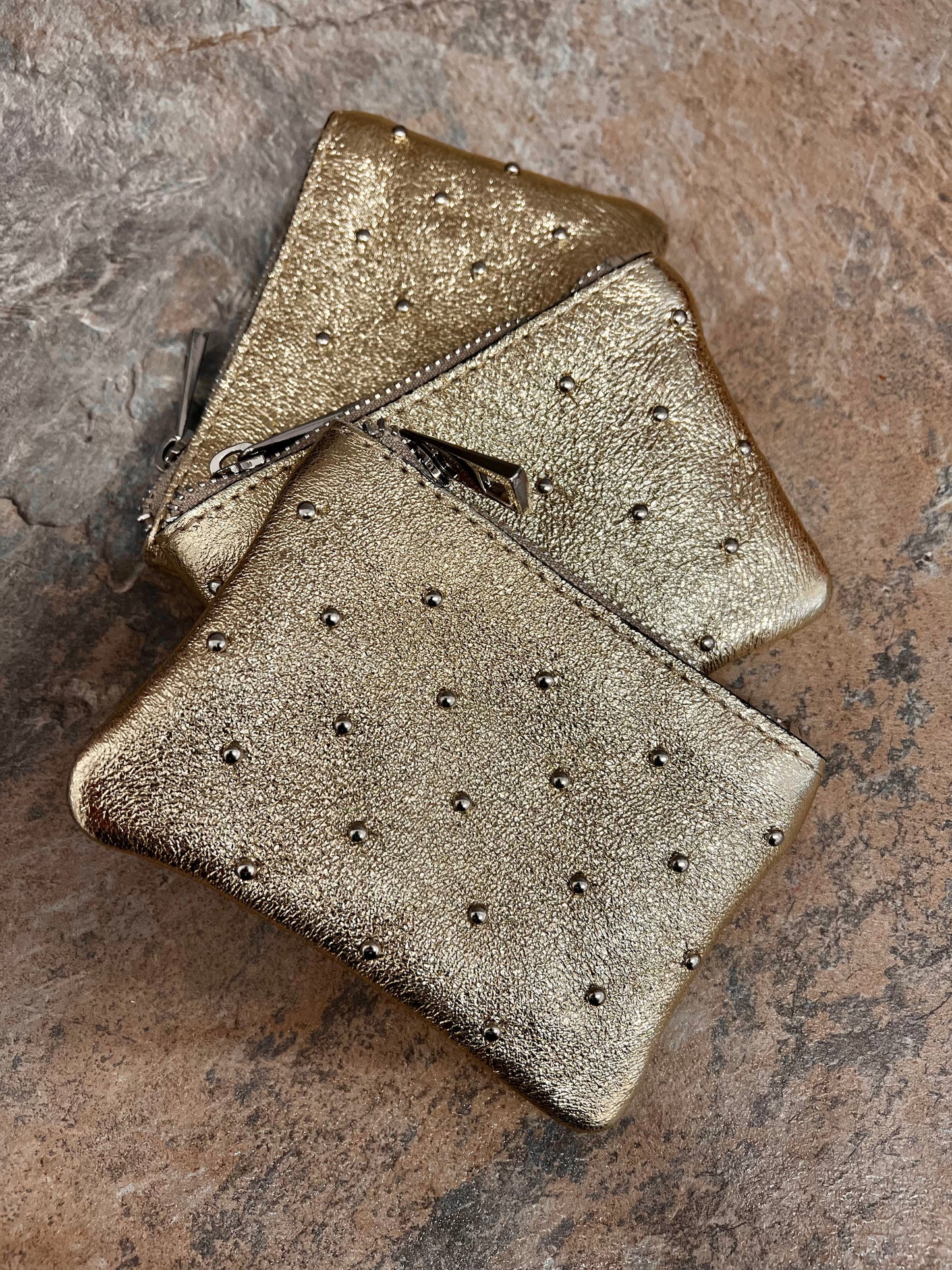 Leather studded gold purse