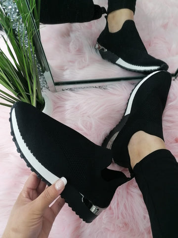 Black mesh slip on trainers
